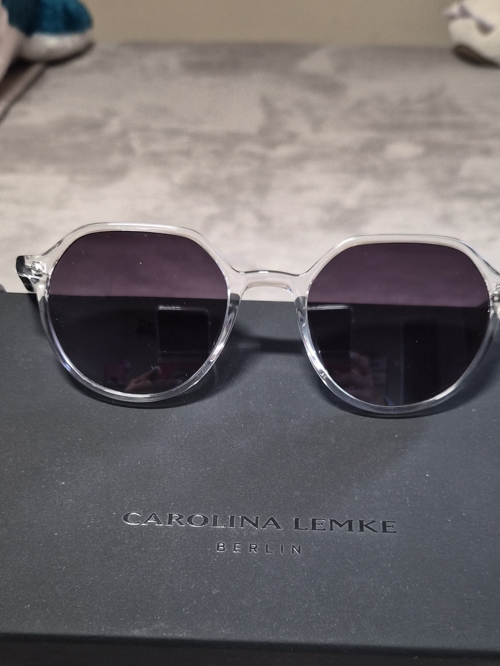 Caroline Lemke Clear Frame Sunglasses with Dark Lenses